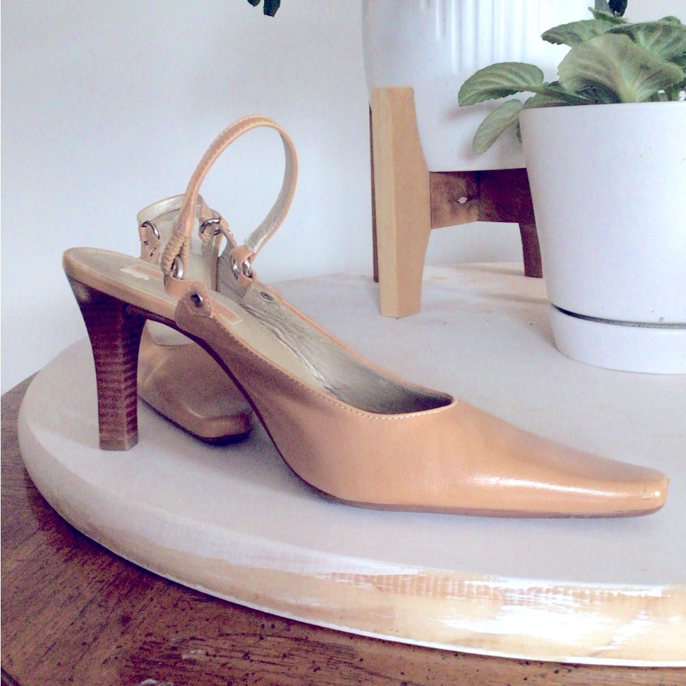Tan sling back with 3” heel. Slightly used wears very comfortably